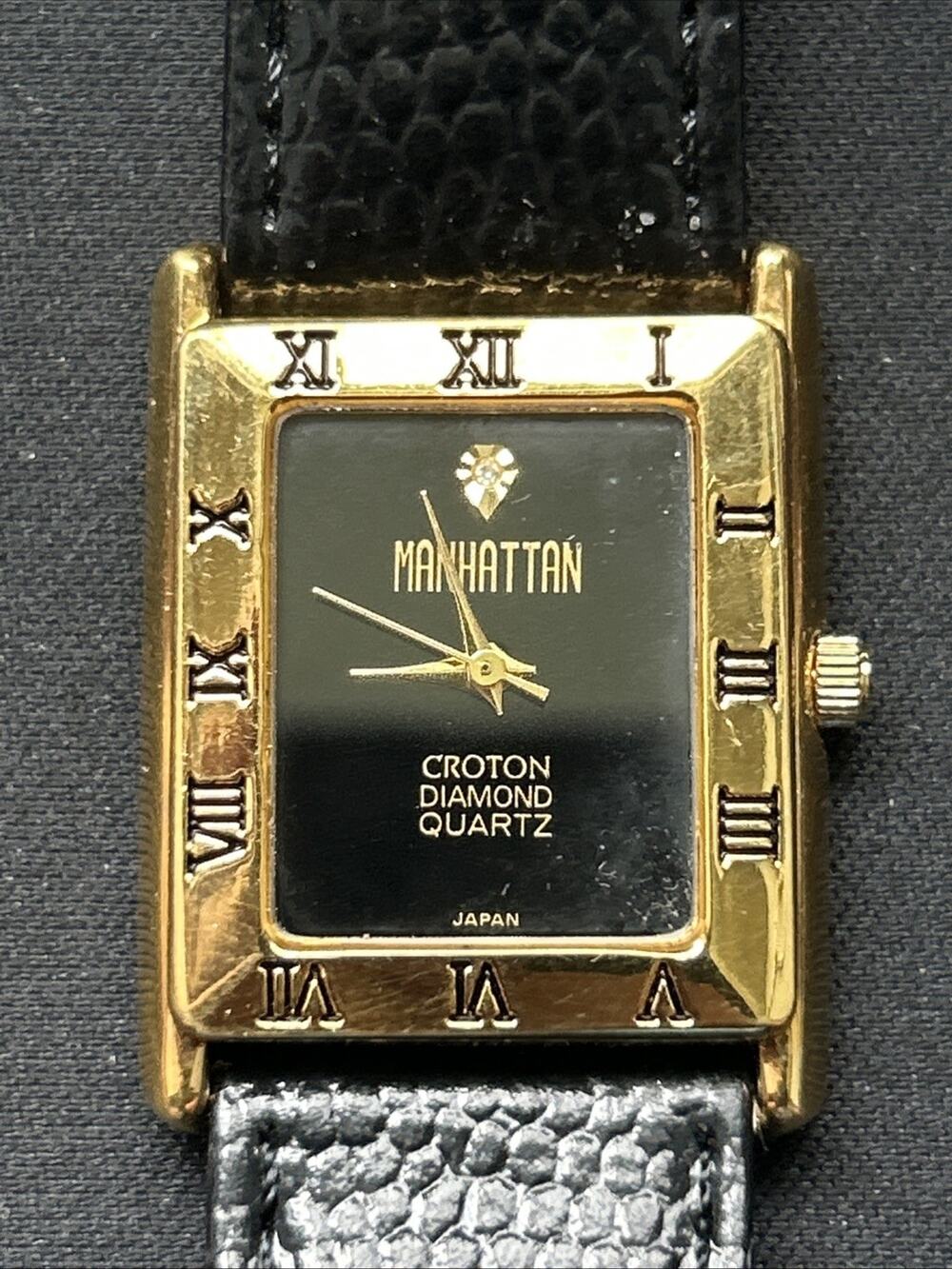 Manhattan Croton Gold Tone Black Dial And Band Women’s Quartz Watch